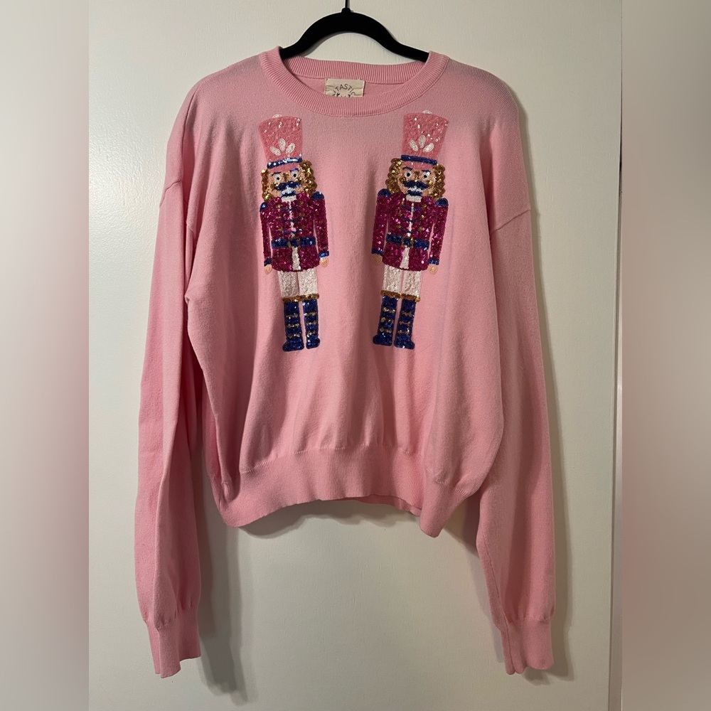 Pink Sweater with Nutcracker Design